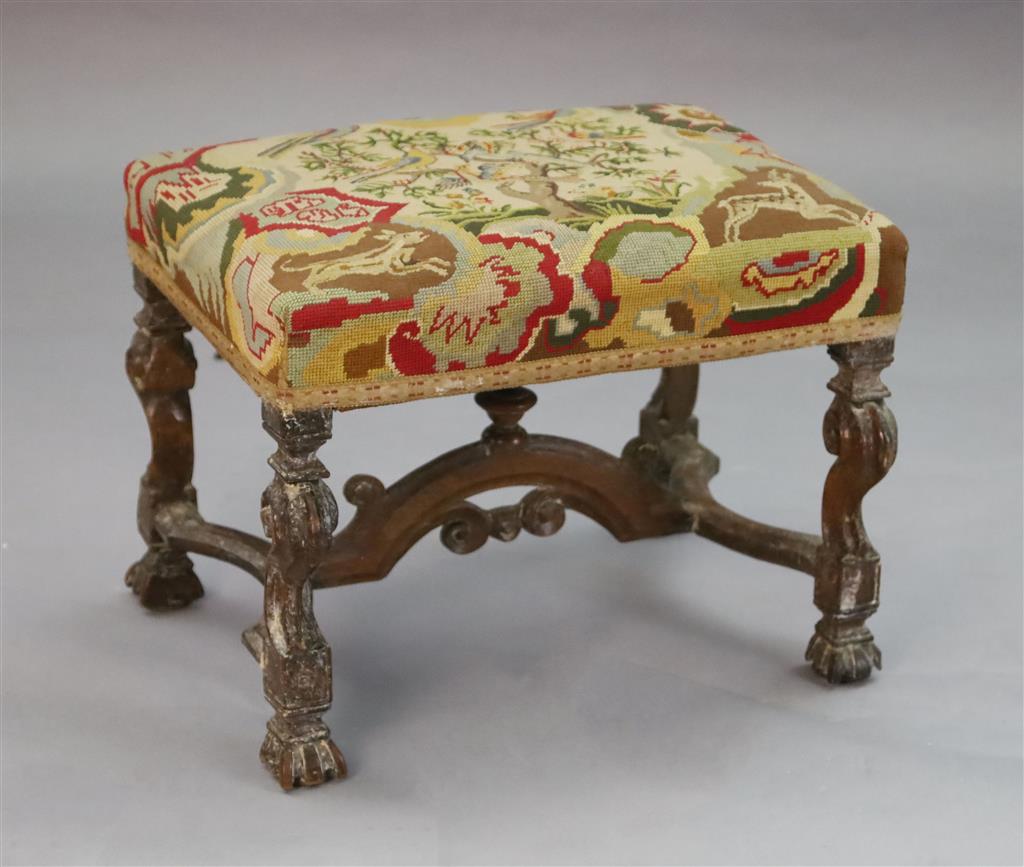 A late 17th century walnut dressing stool, W.1ft 8.5in. D.1ft 5in. H.1ft 4in.